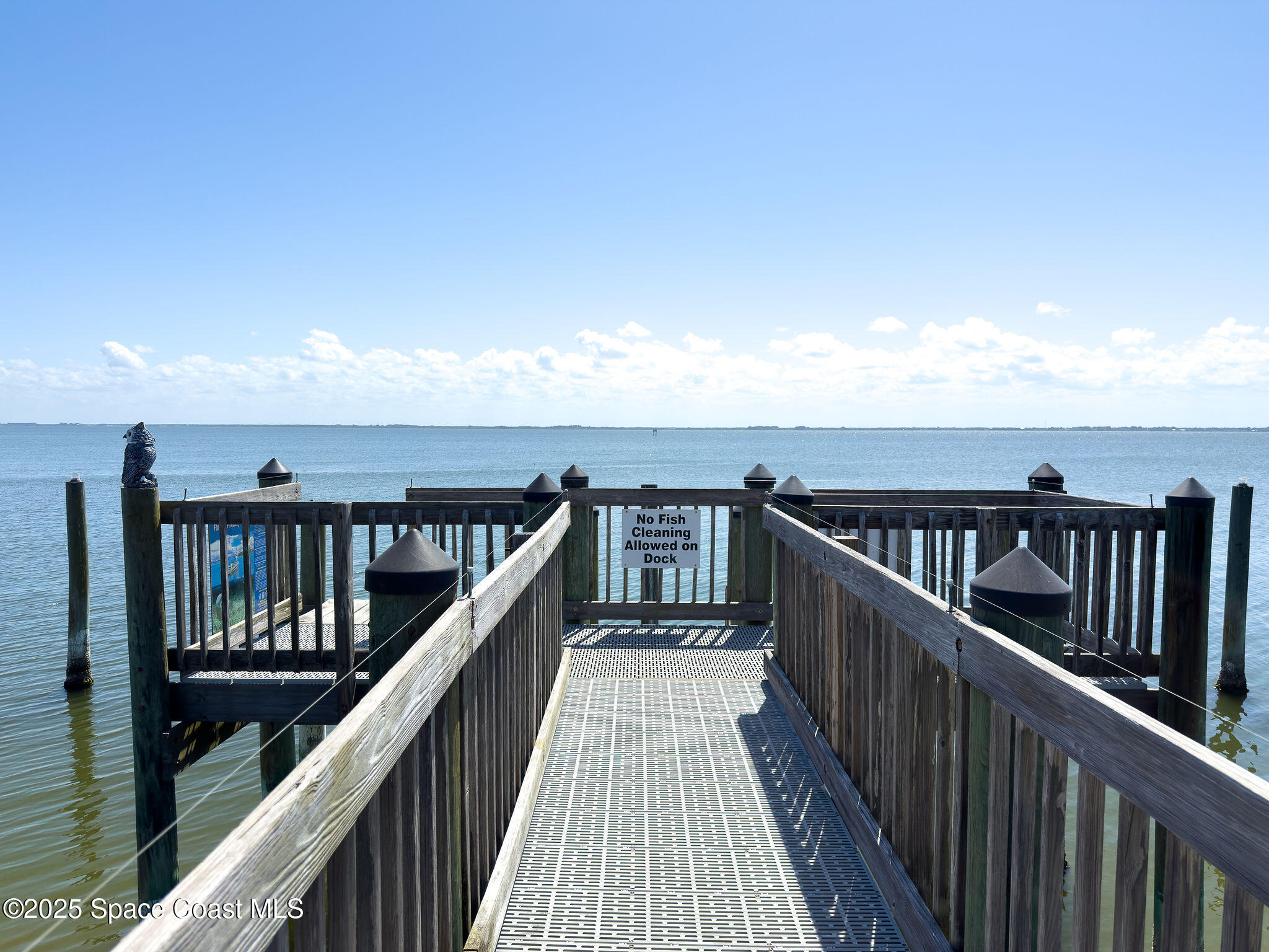 2012 Julep Drive, Unit 304 Cocoa Beach, FL 32931 - Photo 2 of 67 a view of balcony with wooden floor and stairs