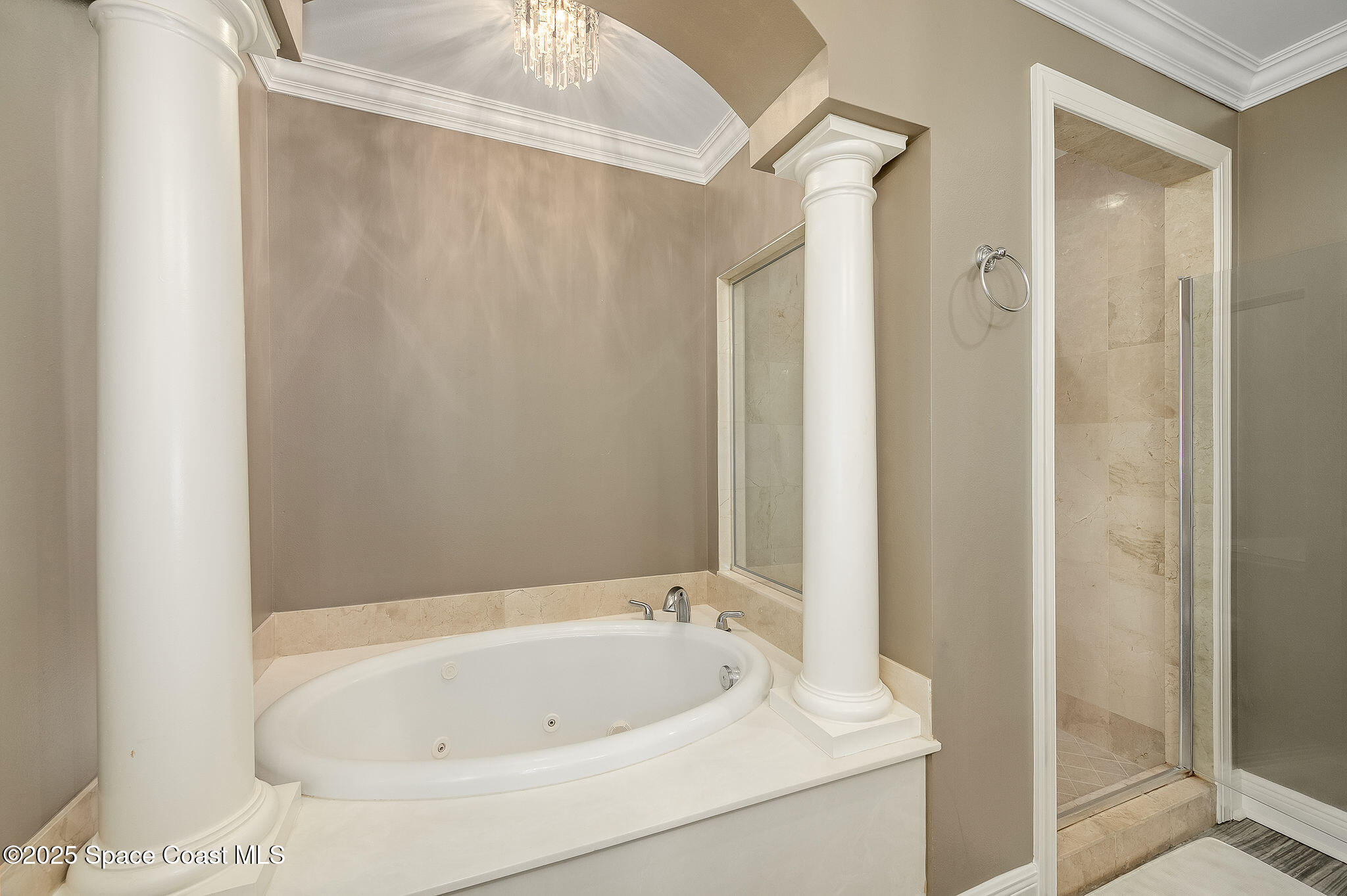 2012 Julep Drive, Unit 304 Cocoa Beach, FL 32931 - Photo 25 of 67 a white bath tub sitting next to a shower