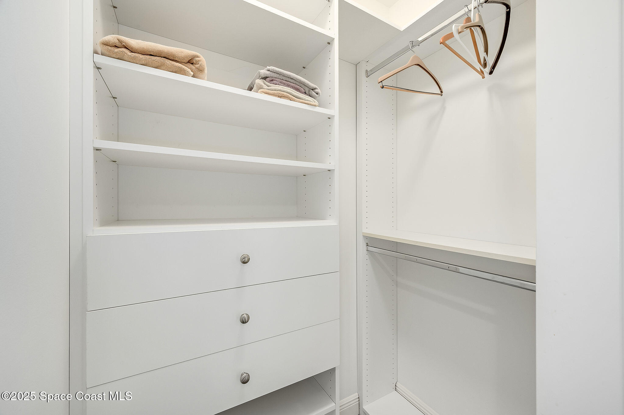 2012 Julep Drive, Unit 304 Cocoa Beach, FL 32931 - Photo 27 of 67 a close up view of racks on the wall