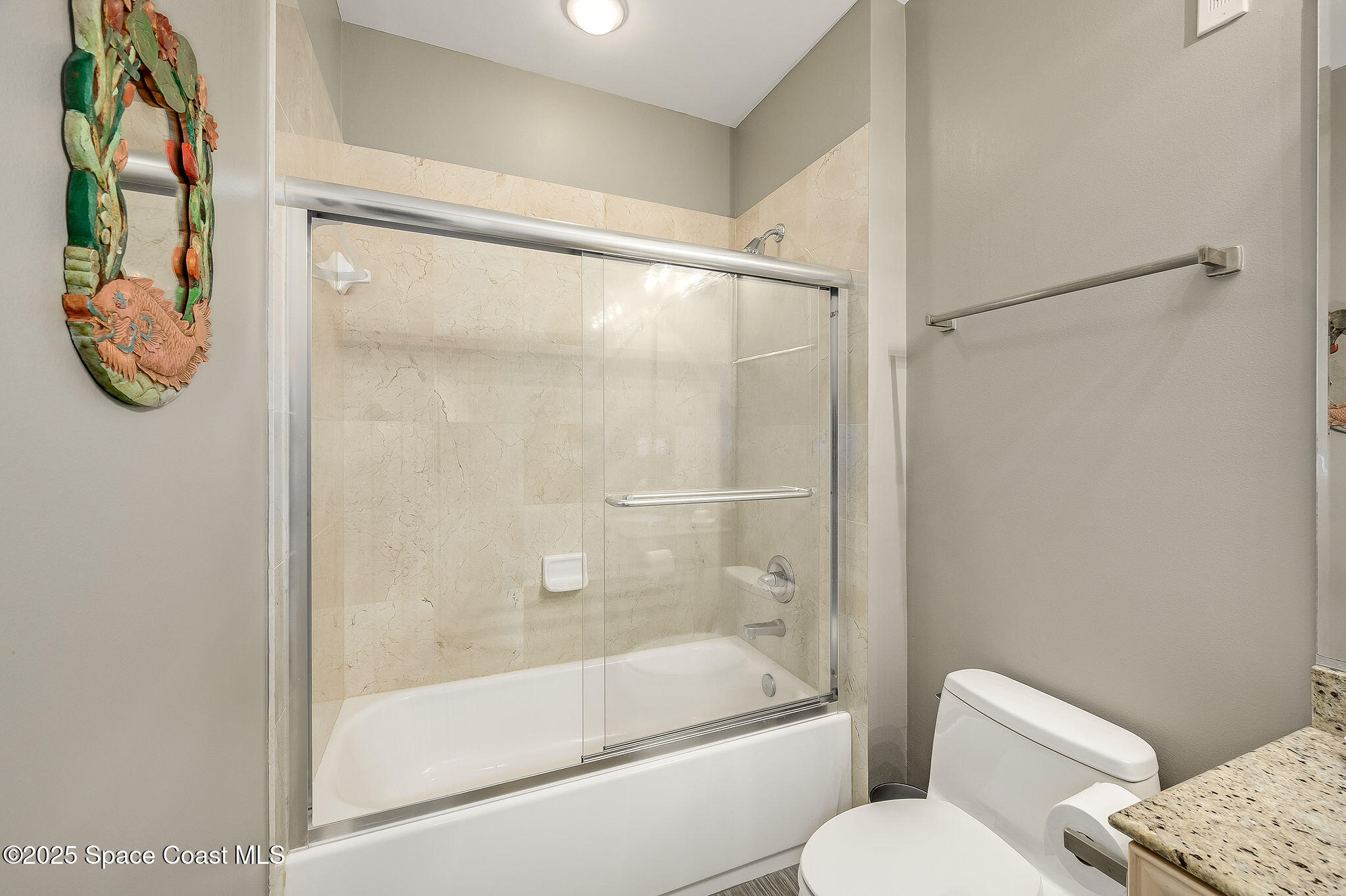 2012 Julep Drive, Unit 304 Cocoa Beach, FL 32931 - Photo 39 of 67 a bathroom with a shower and toilet