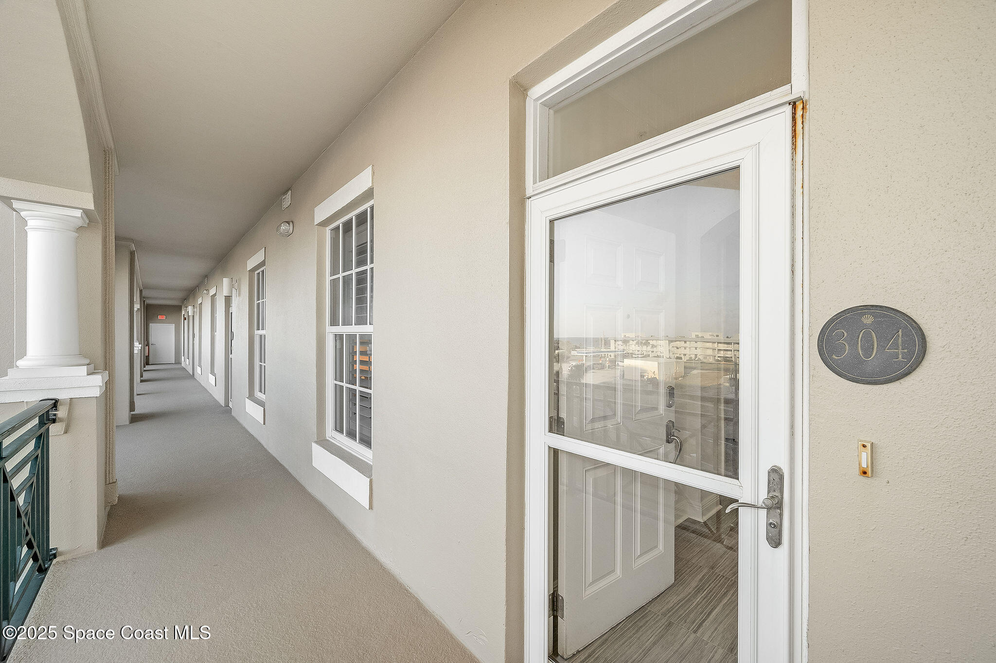 2012 Julep Drive, Unit 304 Cocoa Beach, FL 32931 - Photo 43 of 67 a view of entryway with wooden floor