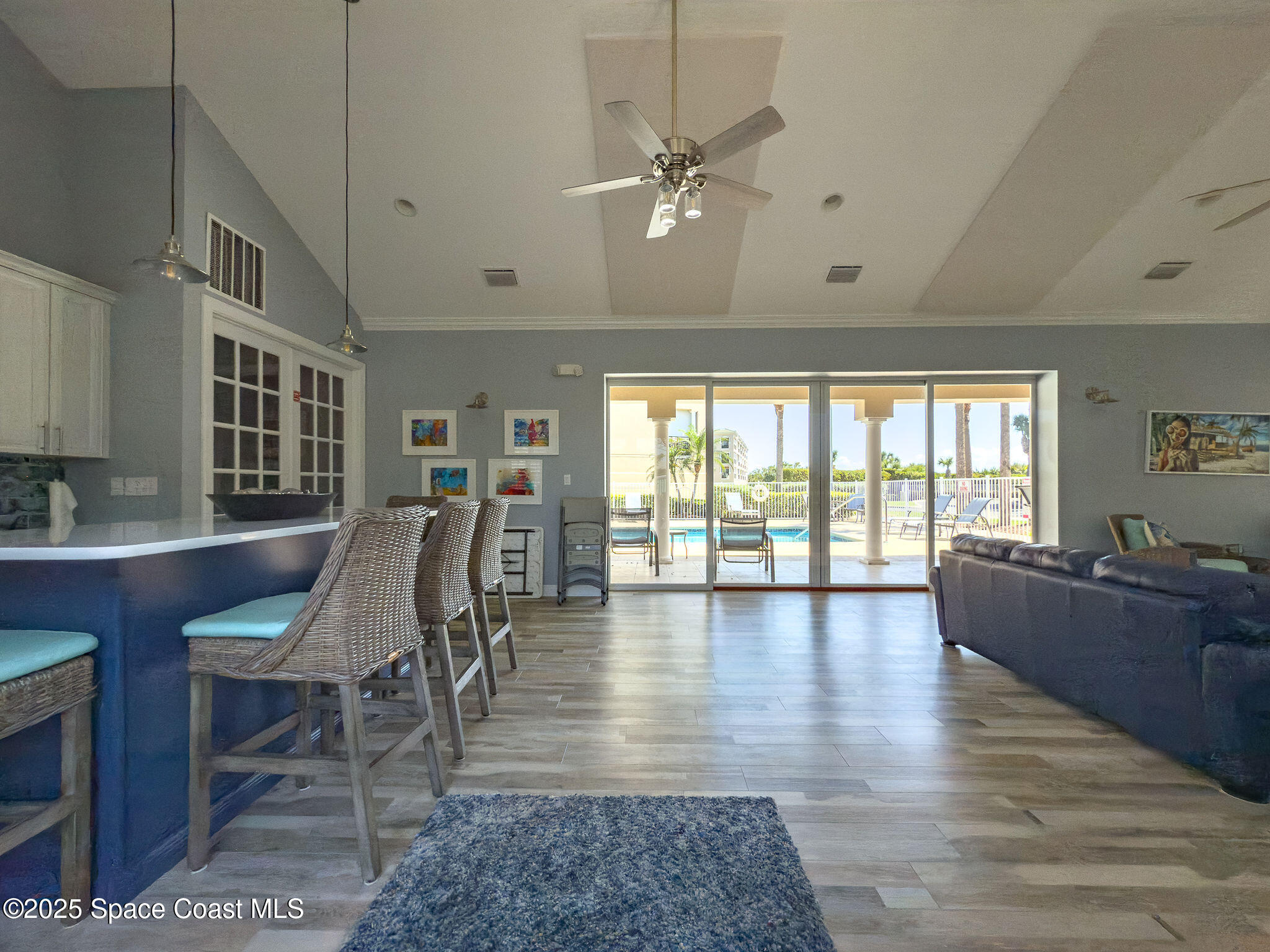 2012 Julep Drive, Unit 304 Cocoa Beach, FL 32931 - Photo 57 of 67 a view of a livingroom with furniture window and wooden floor