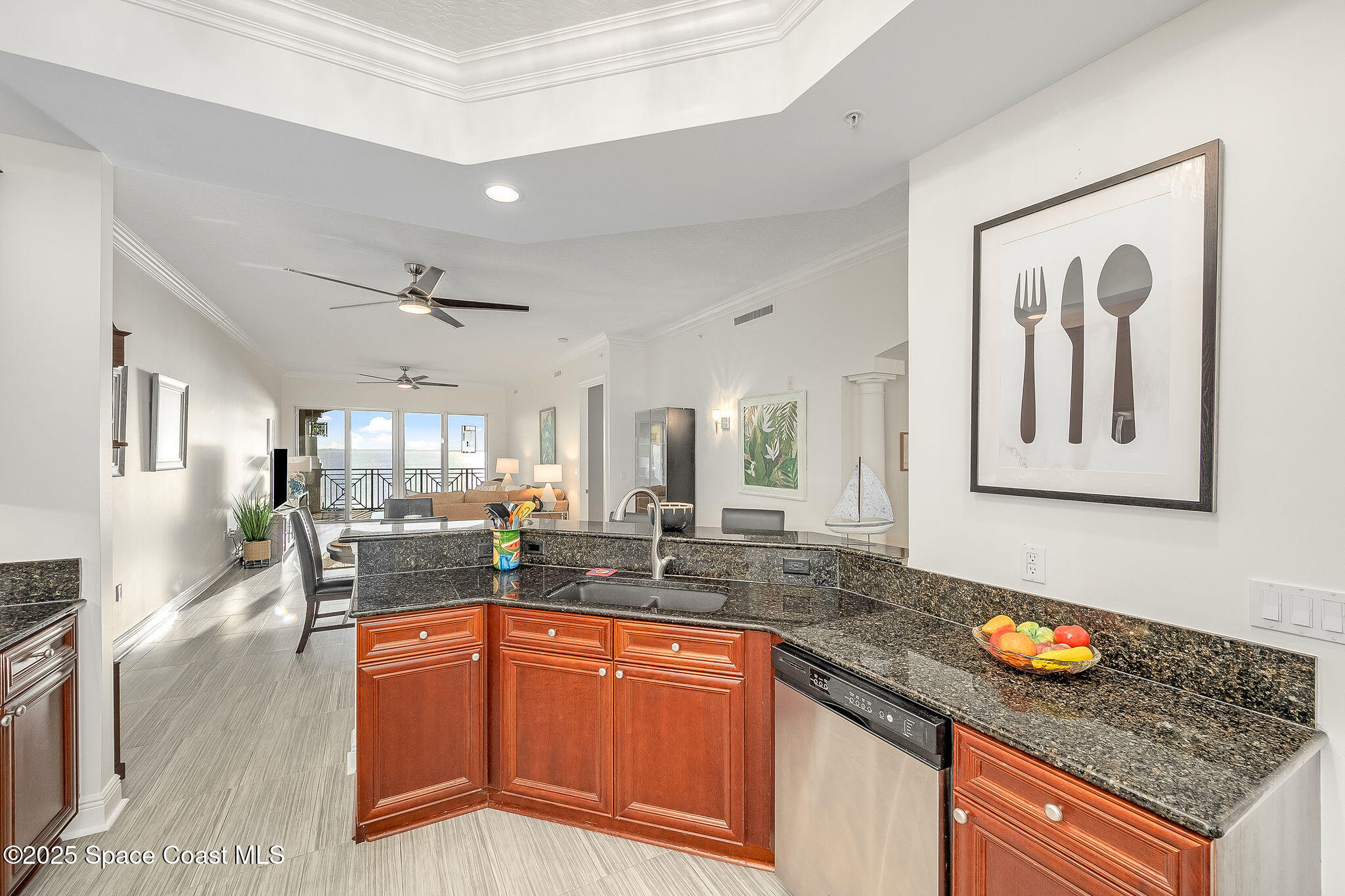 2012 Julep Drive, Unit 304 Cocoa Beach, FL 32931 - Photo 6 of 67 a kitchen with granite countertop lots of counter top space