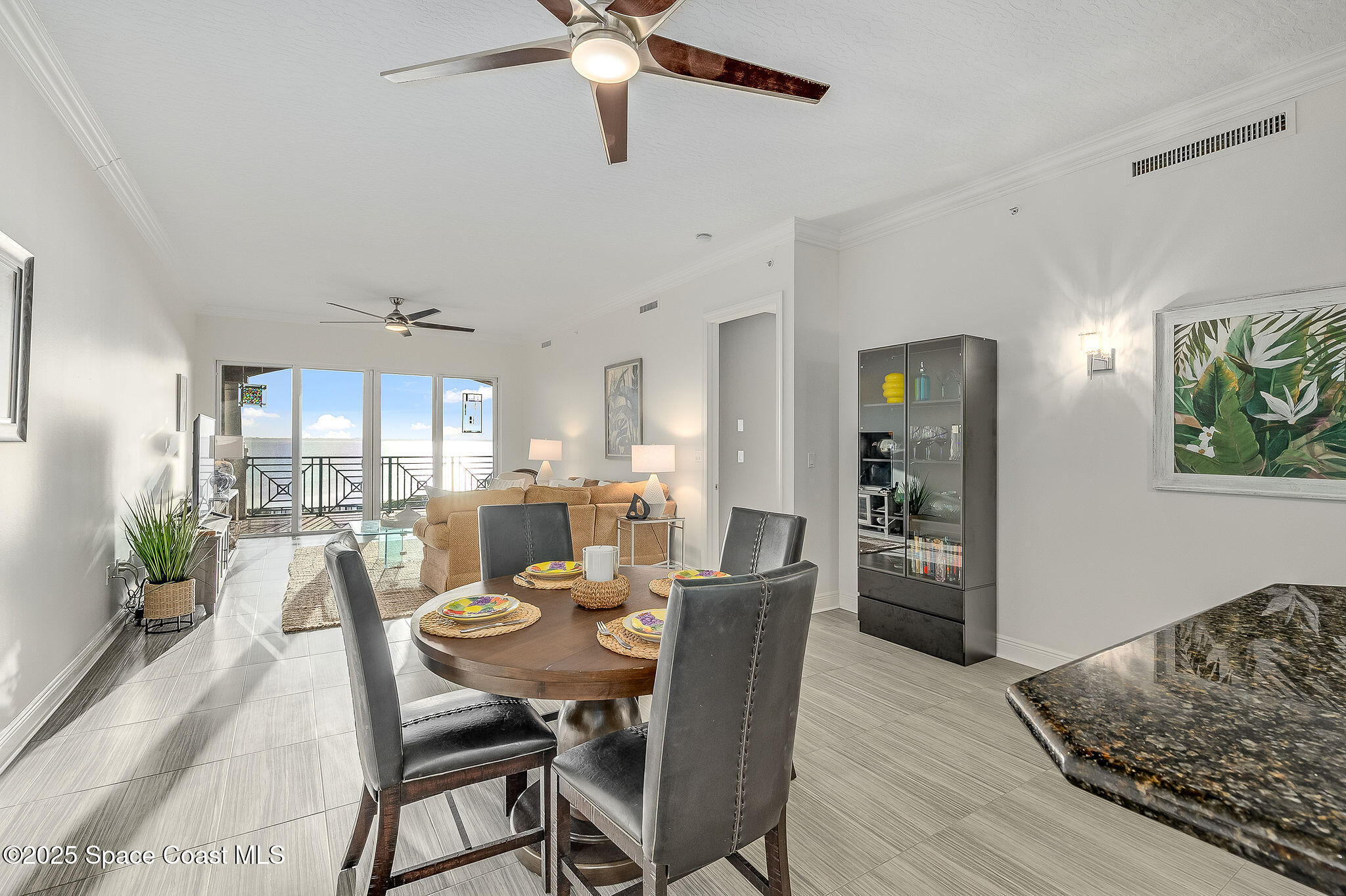 2012 Julep Drive, Unit 304 Cocoa Beach, FL 32931 - Photo 9 of 67 a view of a dining room with furniture