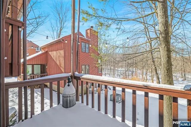 a view of a large building with a small yard