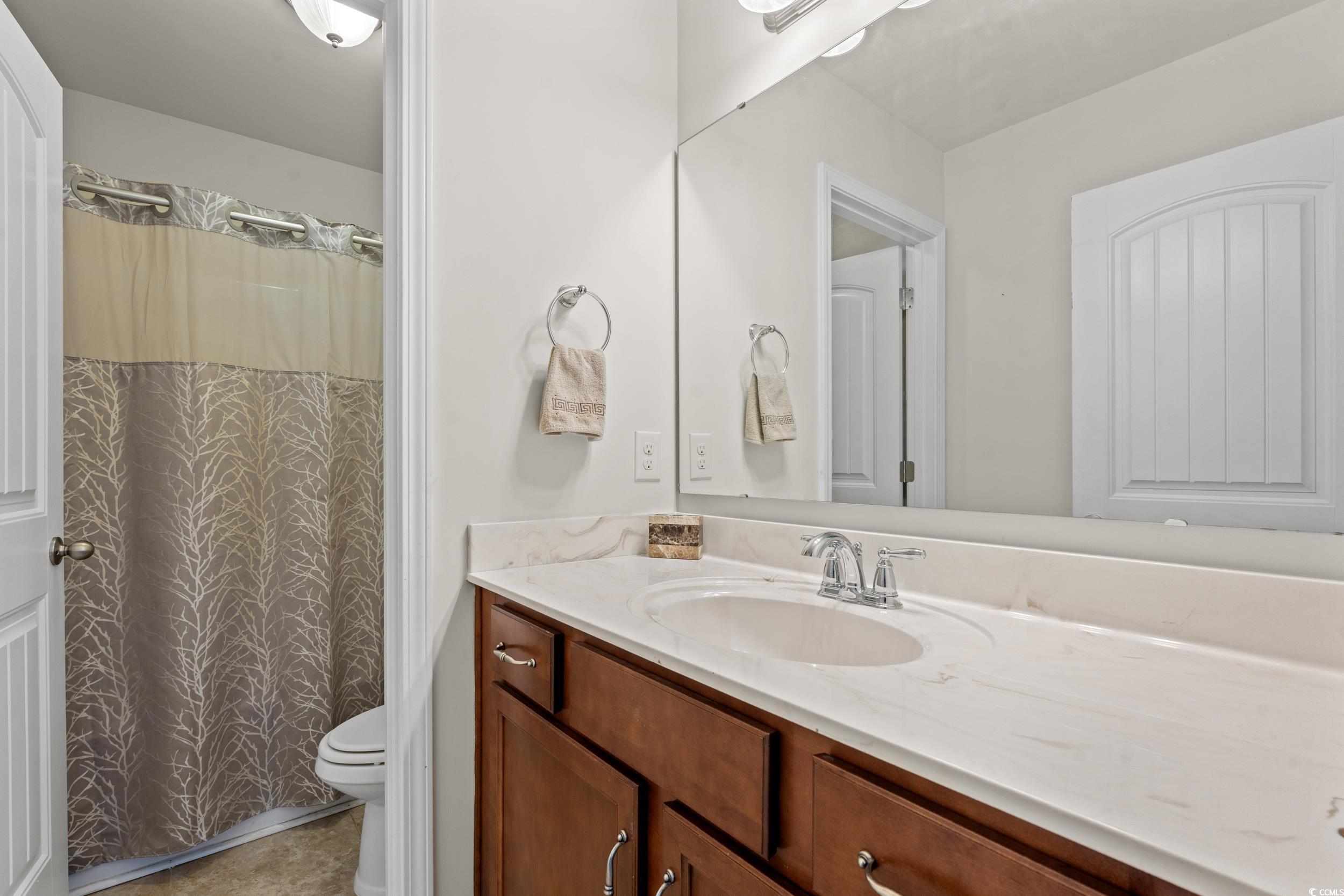 556 Majorca Loop Myrtle Beach, SC 29579 - Photo 20 of 31 Bathroom with vanity and toilet