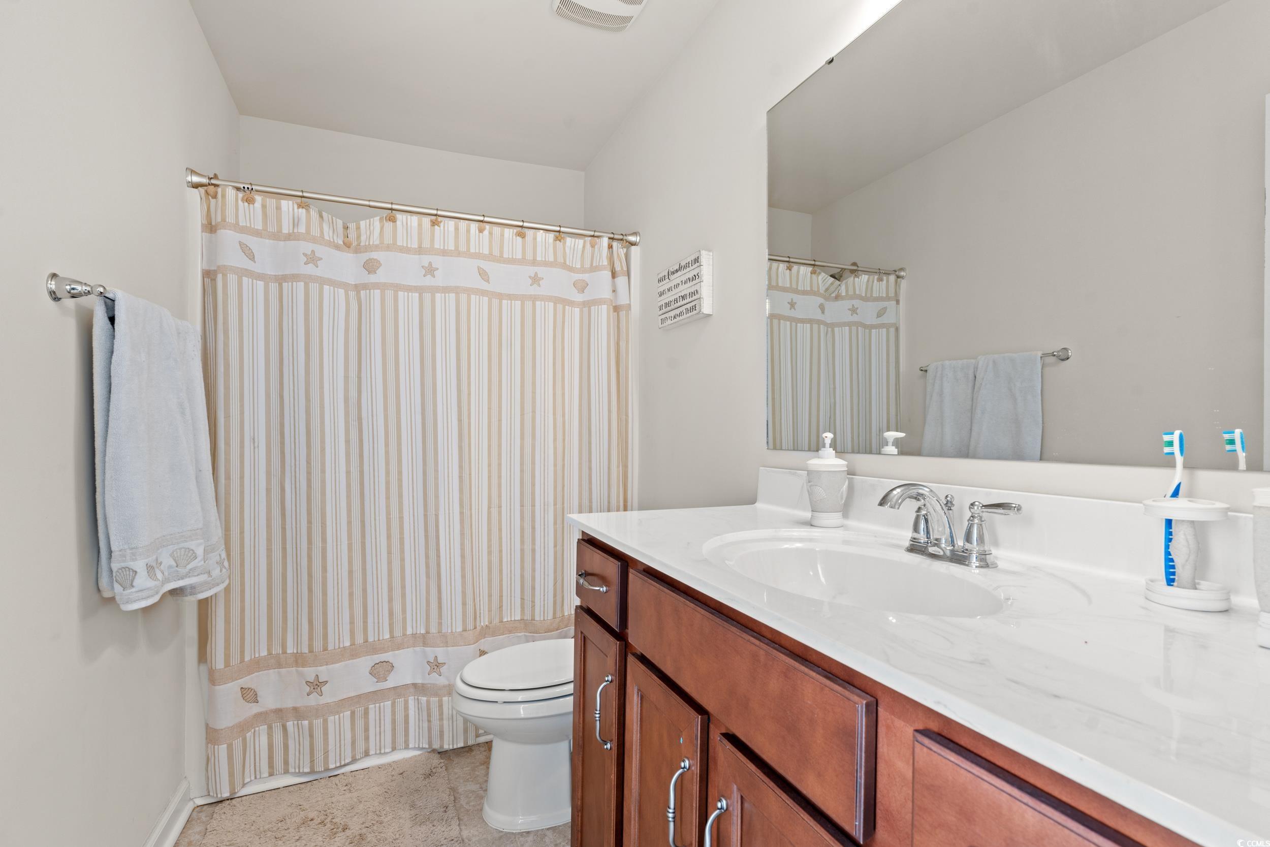 556 Majorca Loop Myrtle Beach, SC 29579 - Photo 22 of 31 Bathroom with vanity and toilet