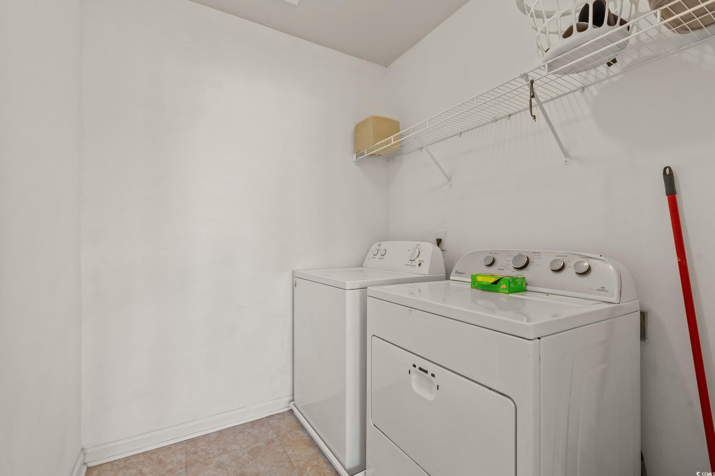556 Majorca Loop Myrtle Beach, SC 29579 - Photo 24 of 31 Laundry area featuring washing machine and dryer