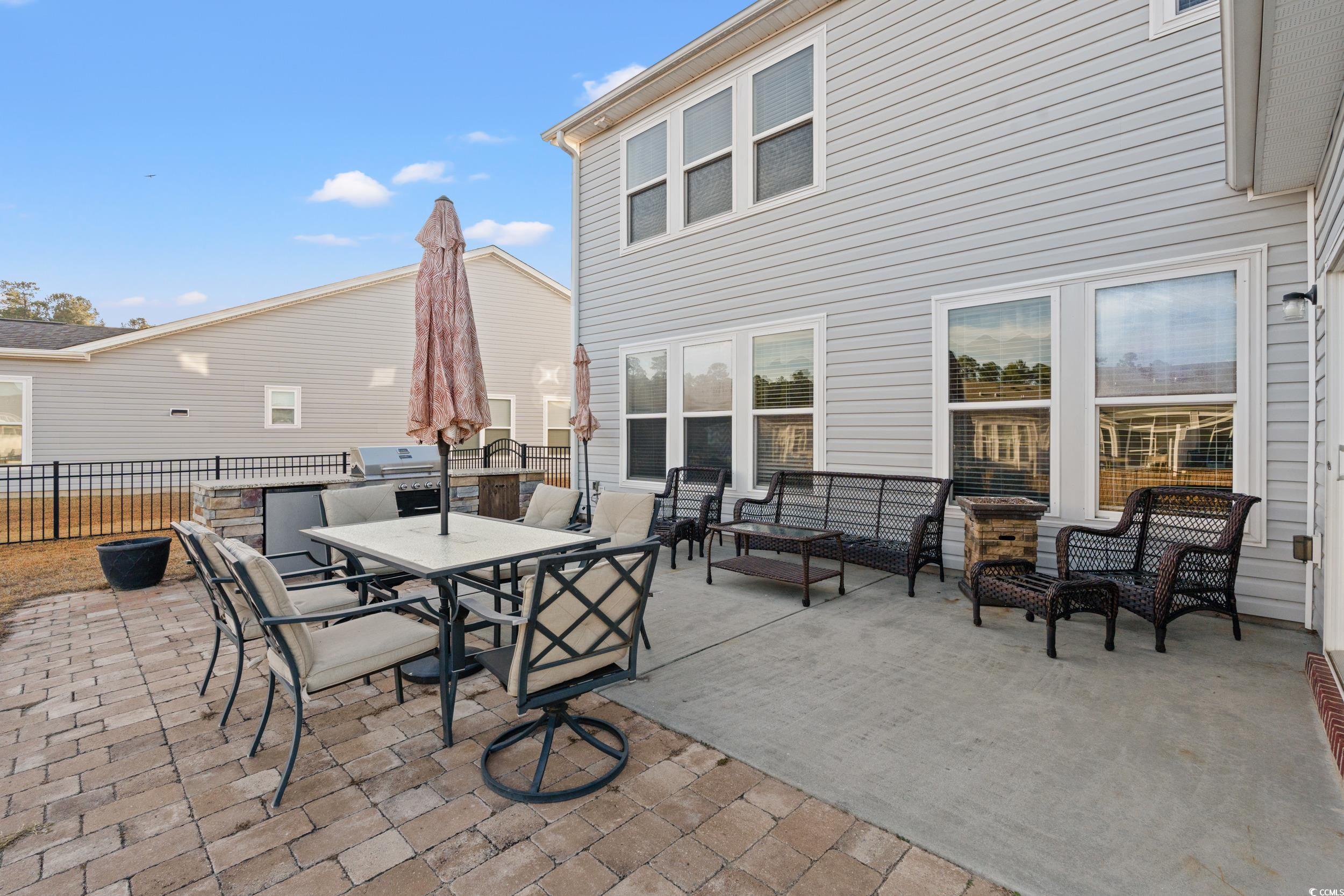 556 Majorca Loop Myrtle Beach, SC 29579 - Photo 25 of 31 View of patio / terrace featuring an outdoor livin