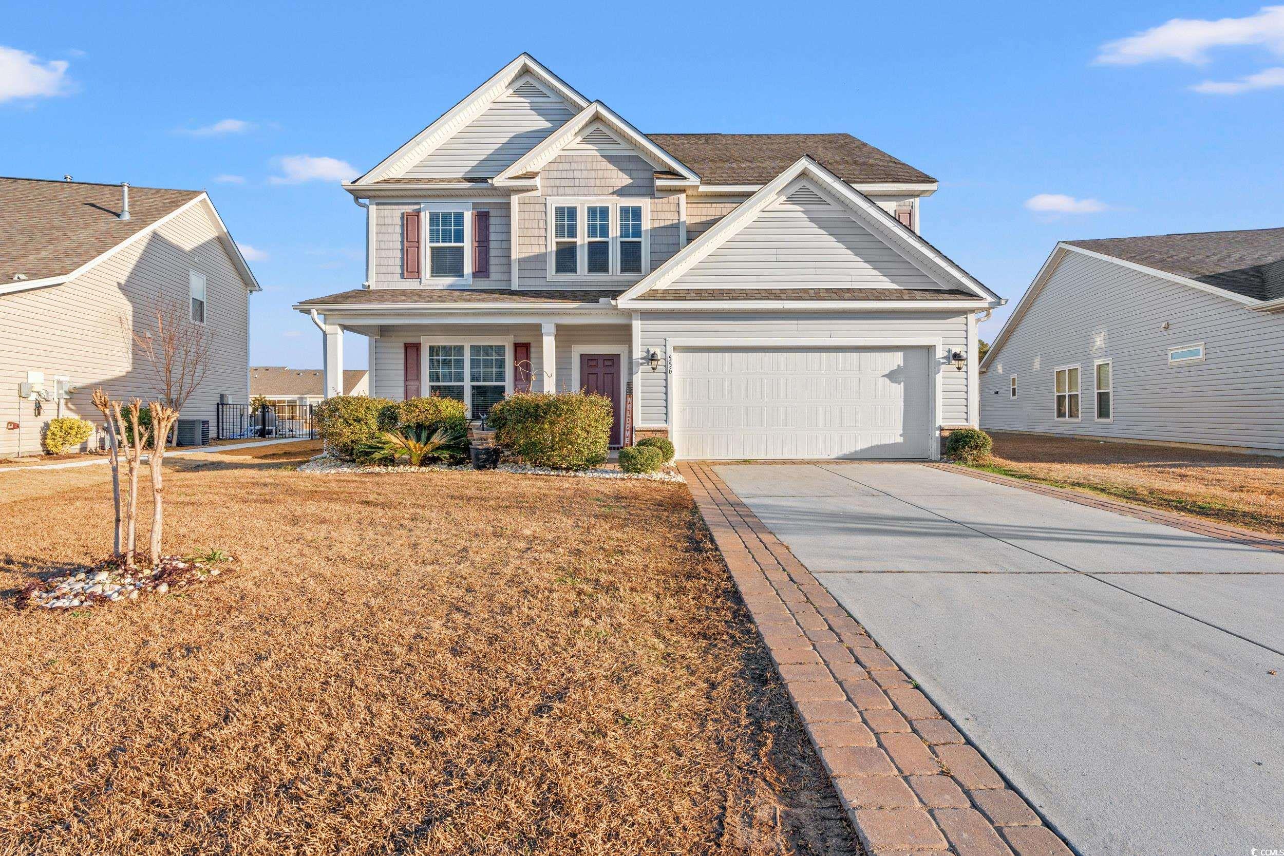 556 Majorca Loop Myrtle Beach, SC 29579 - Photo 28 of 31 Craftsman inspired home featuring a front yard