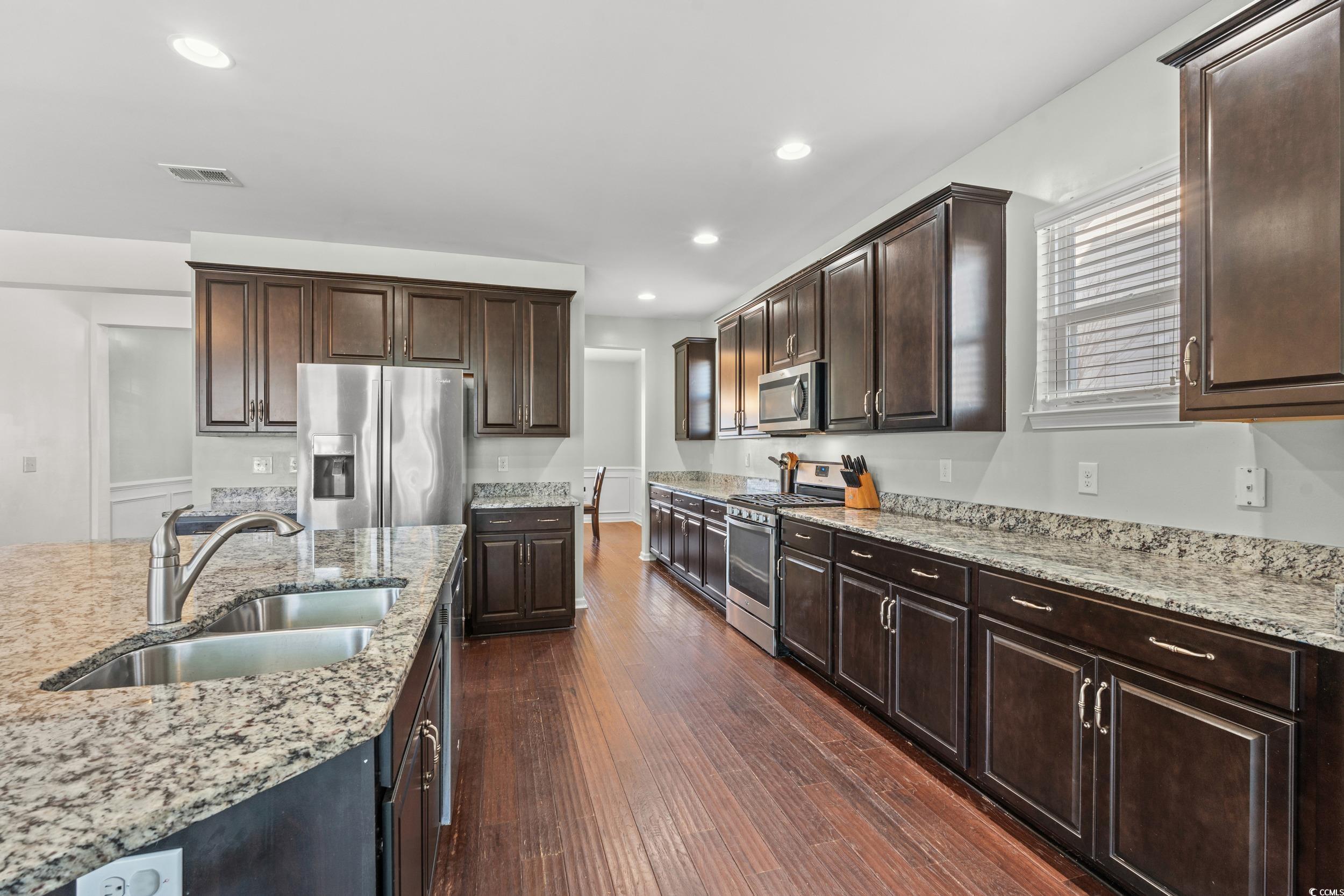 556 Majorca Loop Myrtle Beach, SC 29579 - Photo 6 of 31 Kitchen with appliances with stainless steel finis