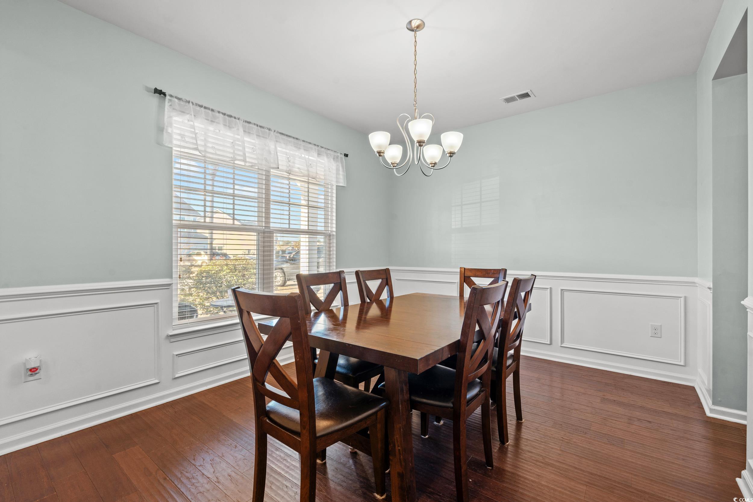 556 Majorca Loop Myrtle Beach, SC 29579 - Photo 8 of 31 Dining space with dark hardwood / wood-style floor