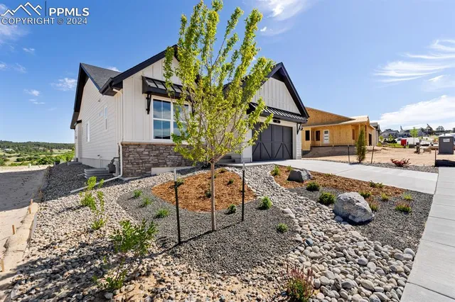 a front view of a house with swimming pool