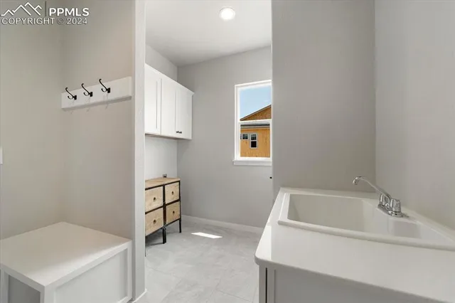 a bathroom with a bathtub sink and toilet