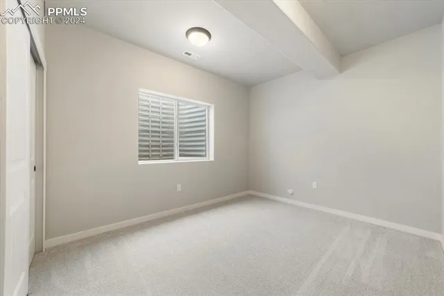 an empty room with a window