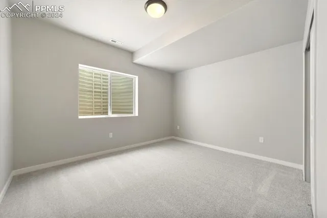 an empty room with a window