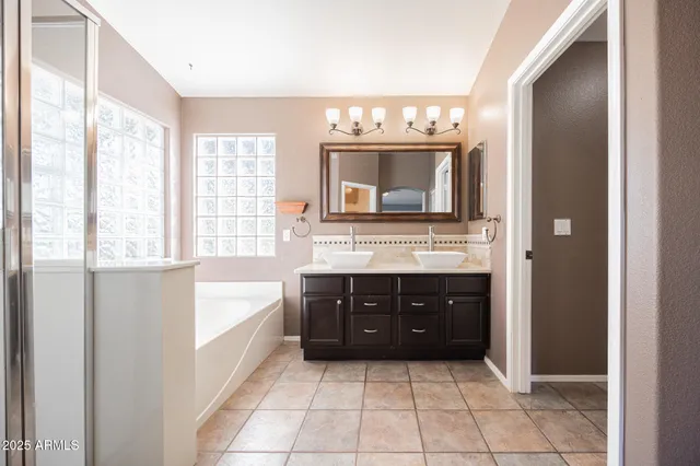 a view of a backyard with sitting area