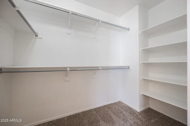 a backyard of a house with yard fire pit and outdoor seating