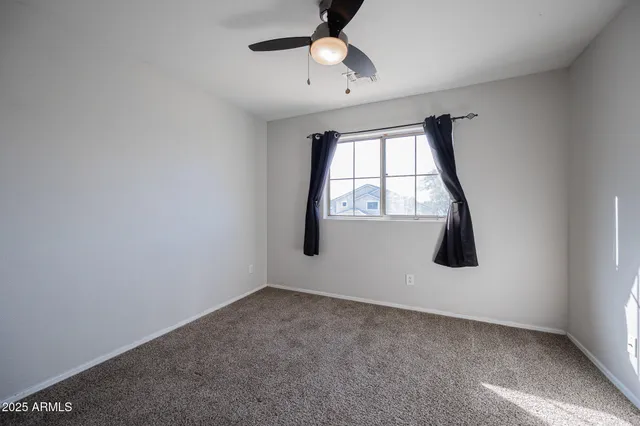 a view of a house with a back yard