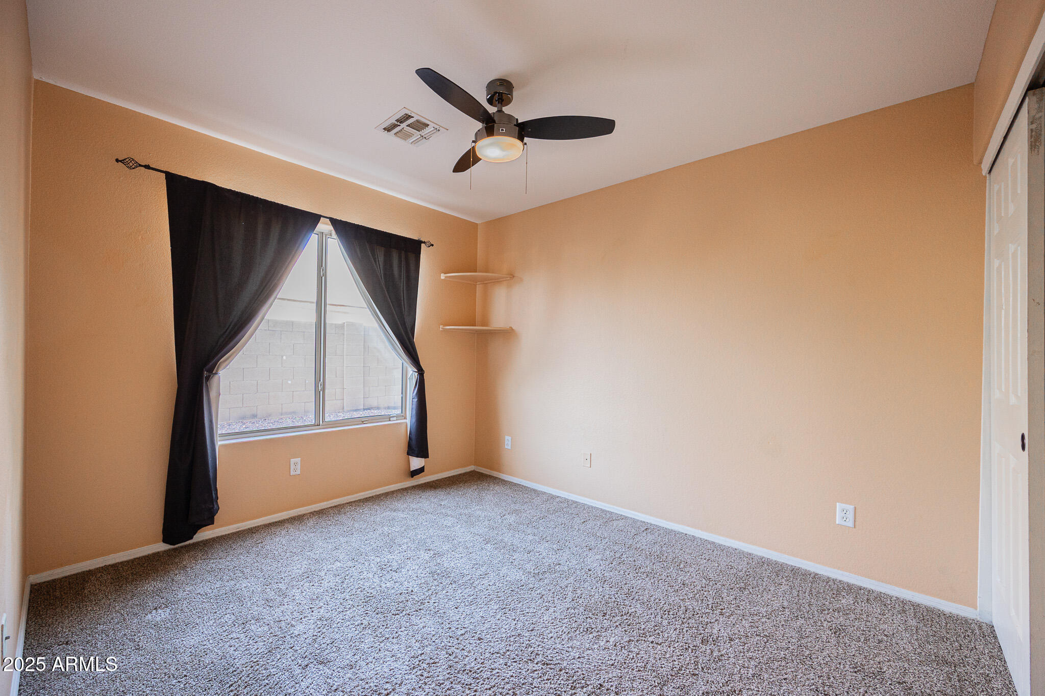 2300 East Augusta Avenue Chandler, AZ 85249 - Photo 39 of 53 an empty room with ceiling fan and entryway