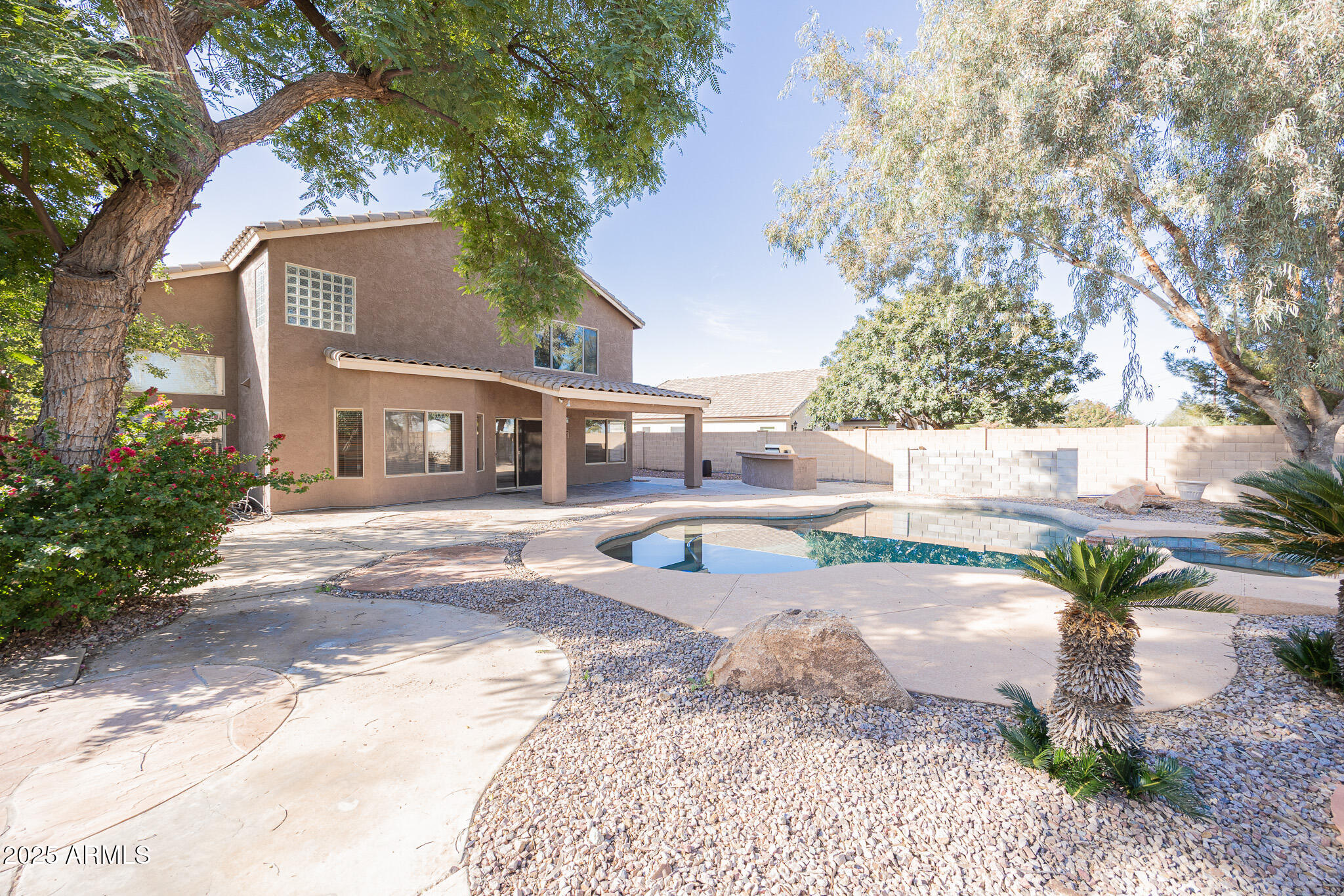 2300 East Augusta Avenue Chandler, AZ 85249 - Photo 48 of 53 a front view of a house with a yard