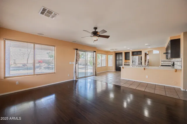 a kitchen with a sink a counter top space and appliances