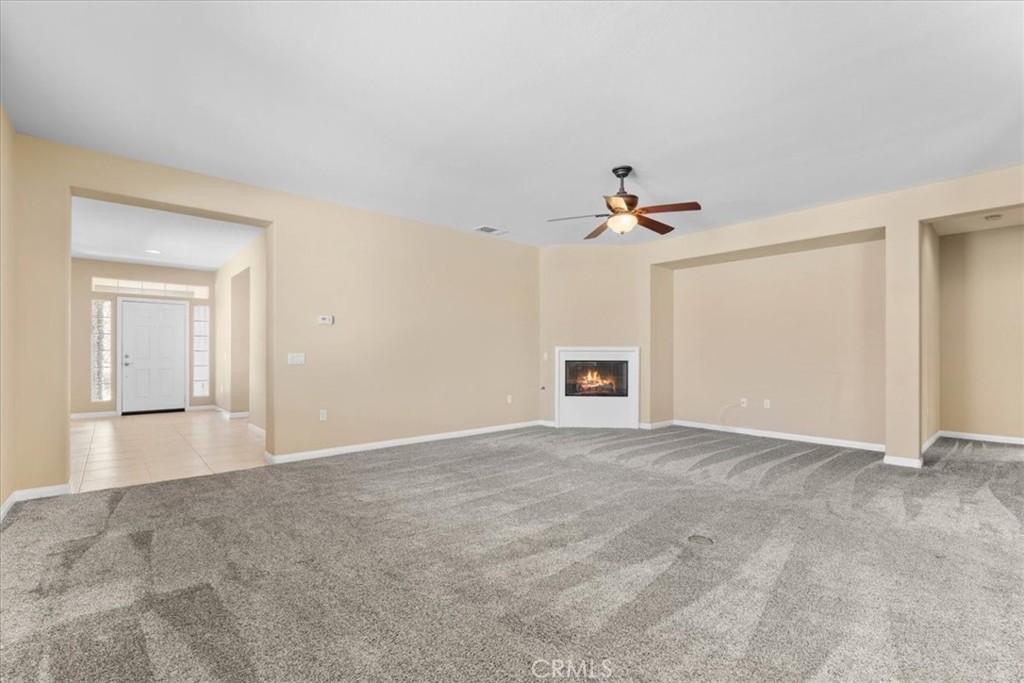 317 Calvert Beaumont, CA 92223 - Photo 14 of 56 Family room with fireplace