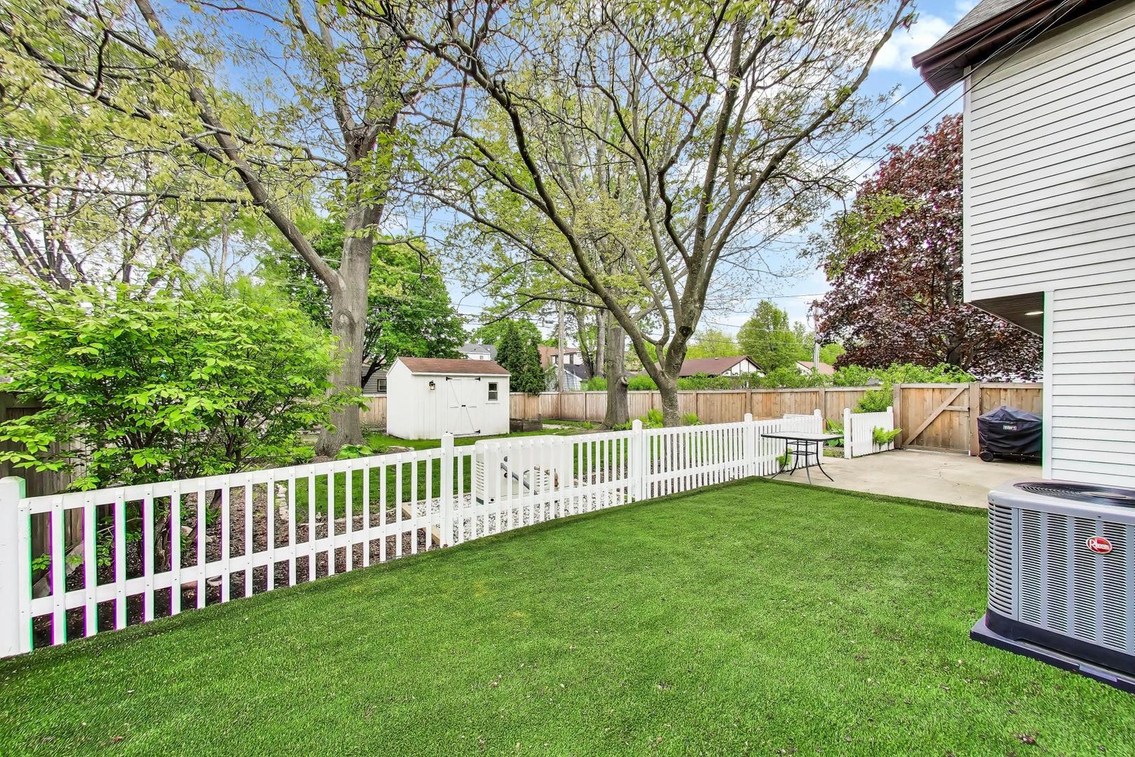 313 South Hi Lusi Avenue Mount Prospect, IL 60056 - Photo 37 of 40 a view of a deck with a fence and a bench