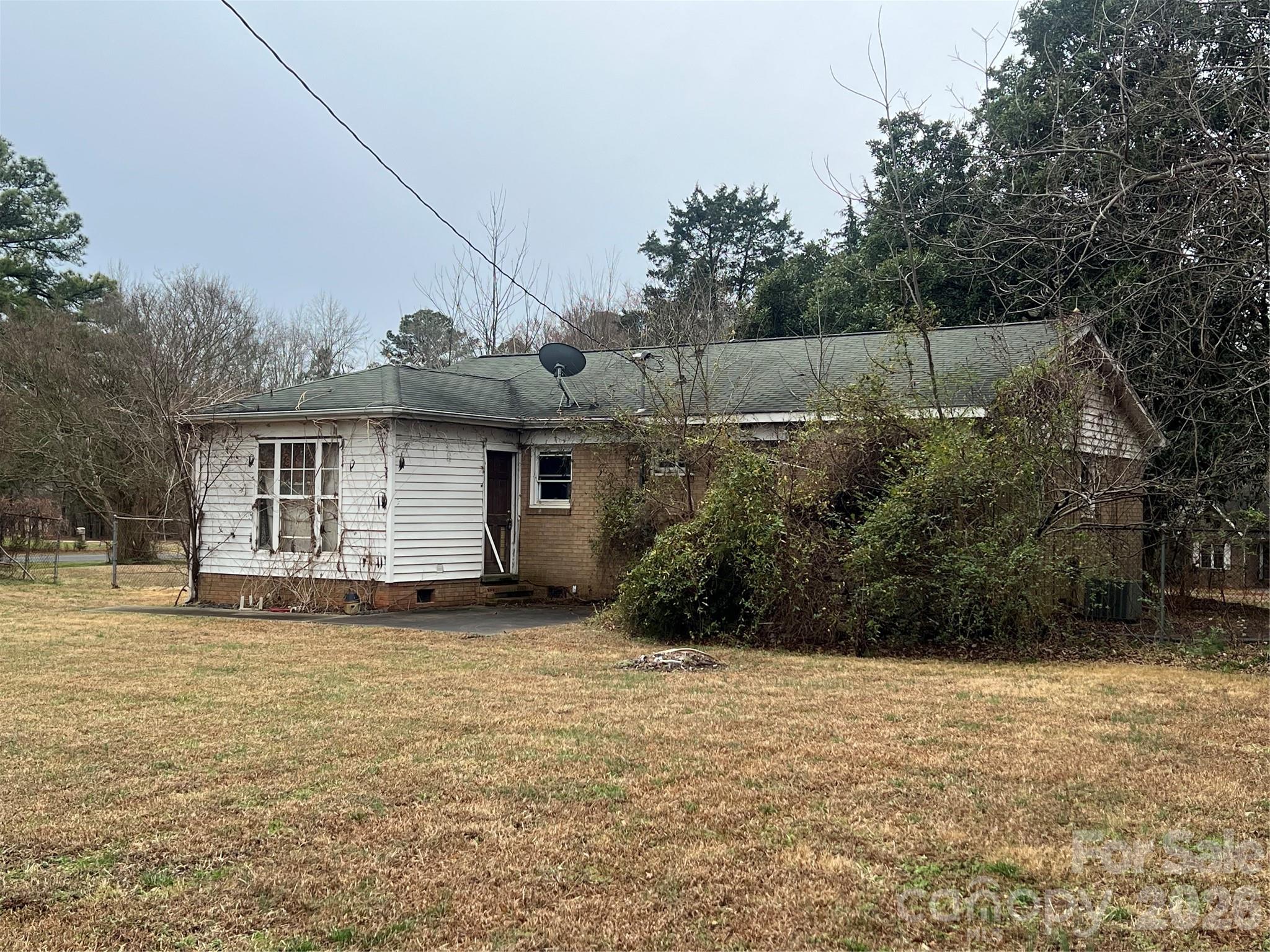 9970 Harrisburg Road Fort Mill, SC 29707 - Photo 2 of 9 a view of a house with a yard