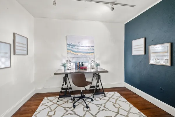 a workspace with wooden floor