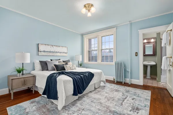 a bed room with a bed and a couch