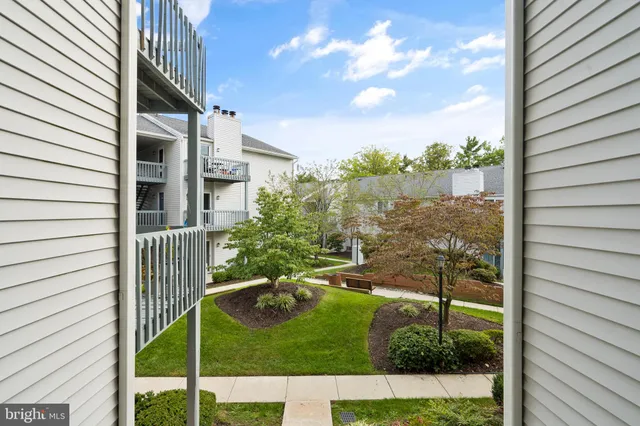 a balcony view with a garden space