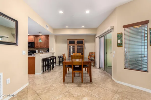 a view of a dining room with furniture