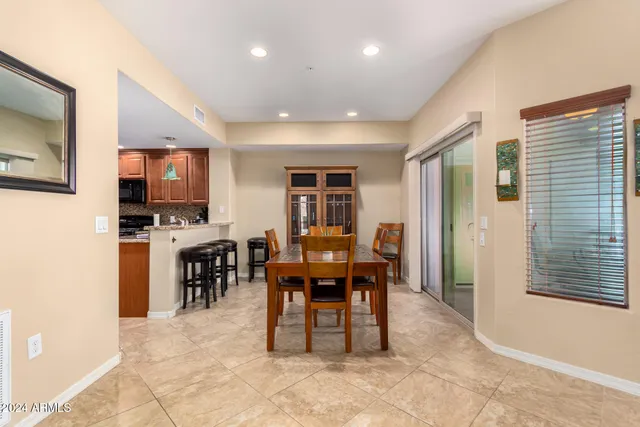 a view of a dining room with furniture