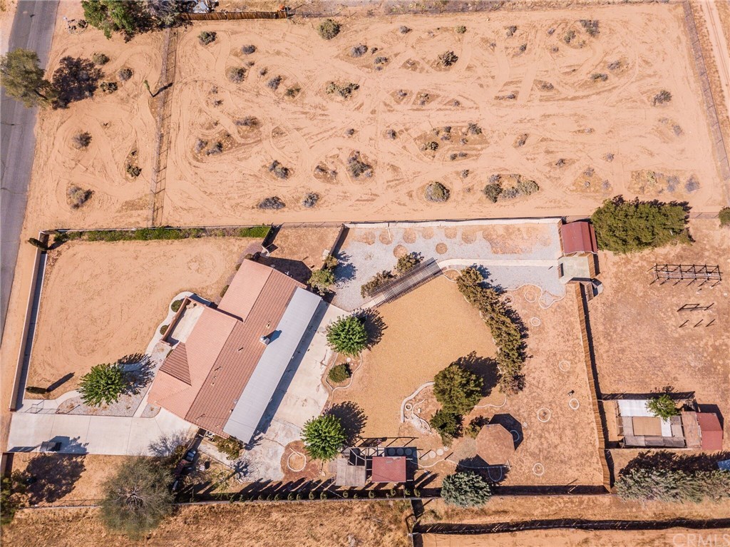 0 Lakota Road Apple Valley, CA 92307 - Photo 3 of 6 an aerial view of a house with a yard and large trees
