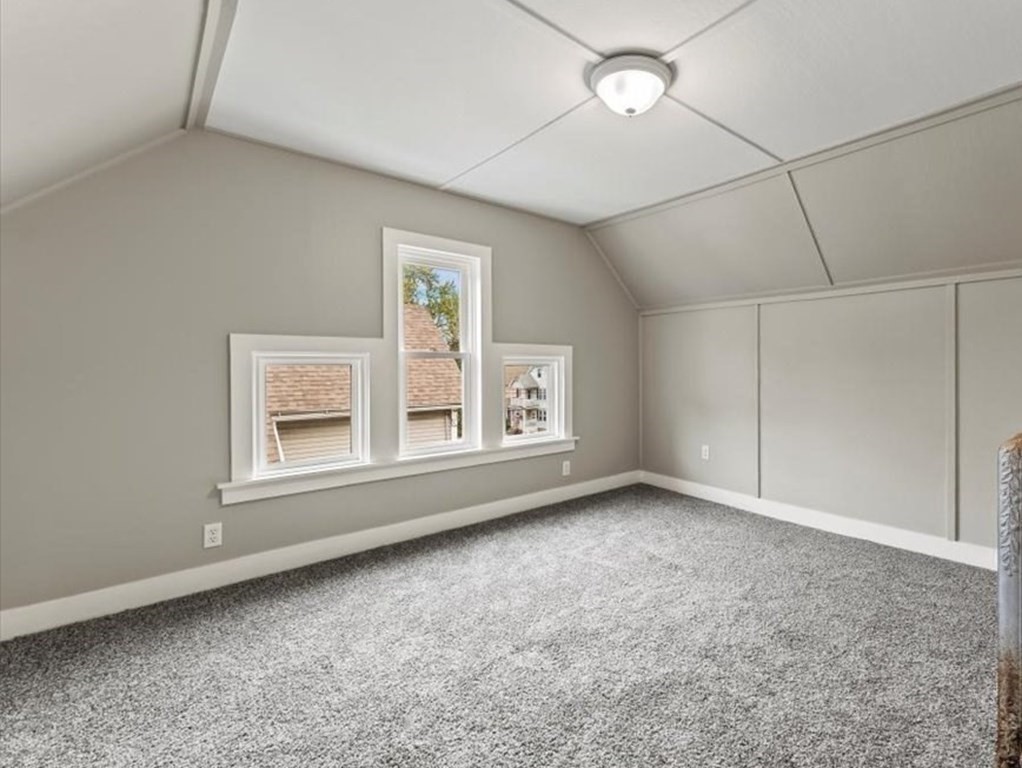 554 Broadway Street Chicopee, MA 01020 - Photo 40 of 42 an empty room with windows and closet