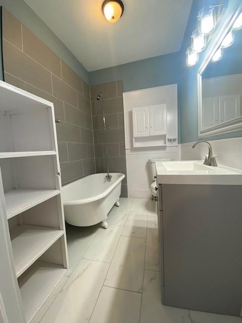 1715 East Pecan Street Sherman, TX 75090 - Photo 12 of 17 a bathroom with a sink toilet and shower