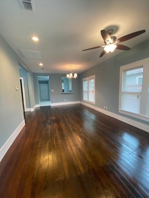 1715 East Pecan Street Sherman, TX 75090 - Photo 4 of 17 a view of empty room with wooden floor