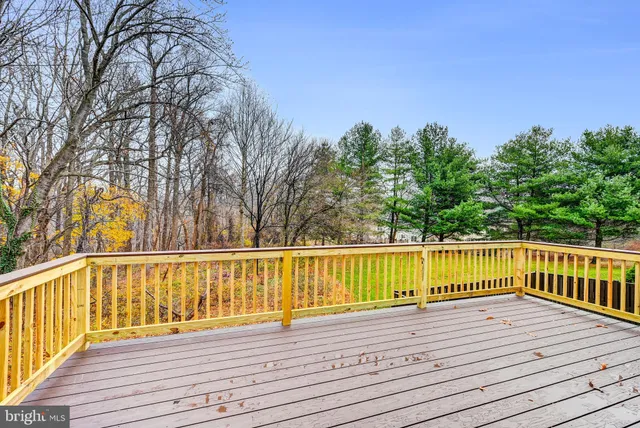 a view of a lake with wooden stairs