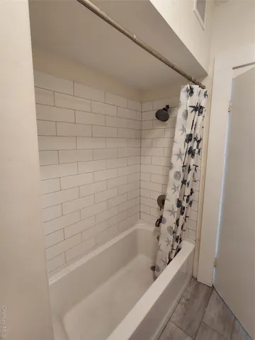 a bathroom with a bathtub