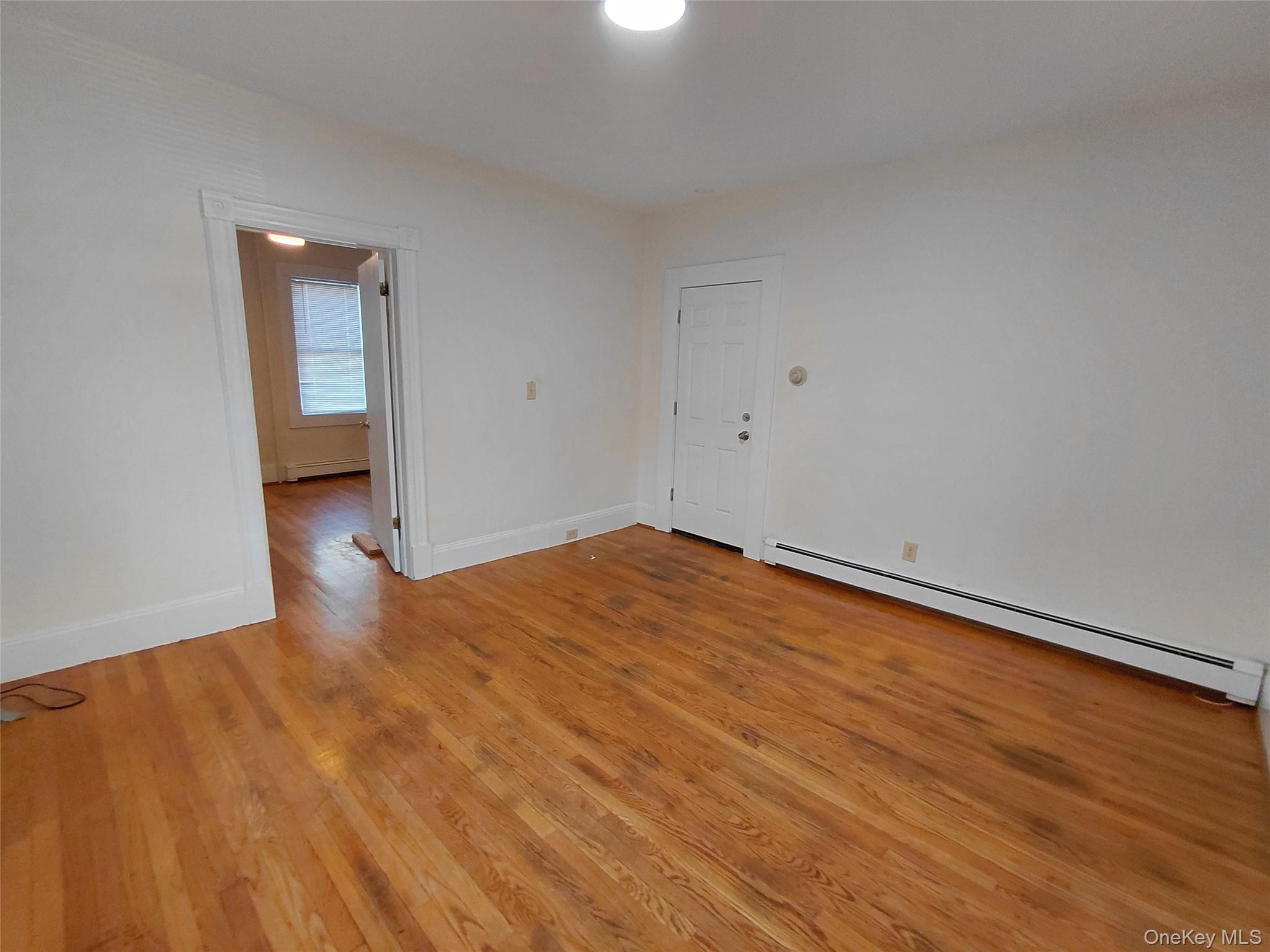 8 Center Street, Unit 1 Kingston, NY 12401 - Photo 10 of 13 a view of empty room with wooden floor