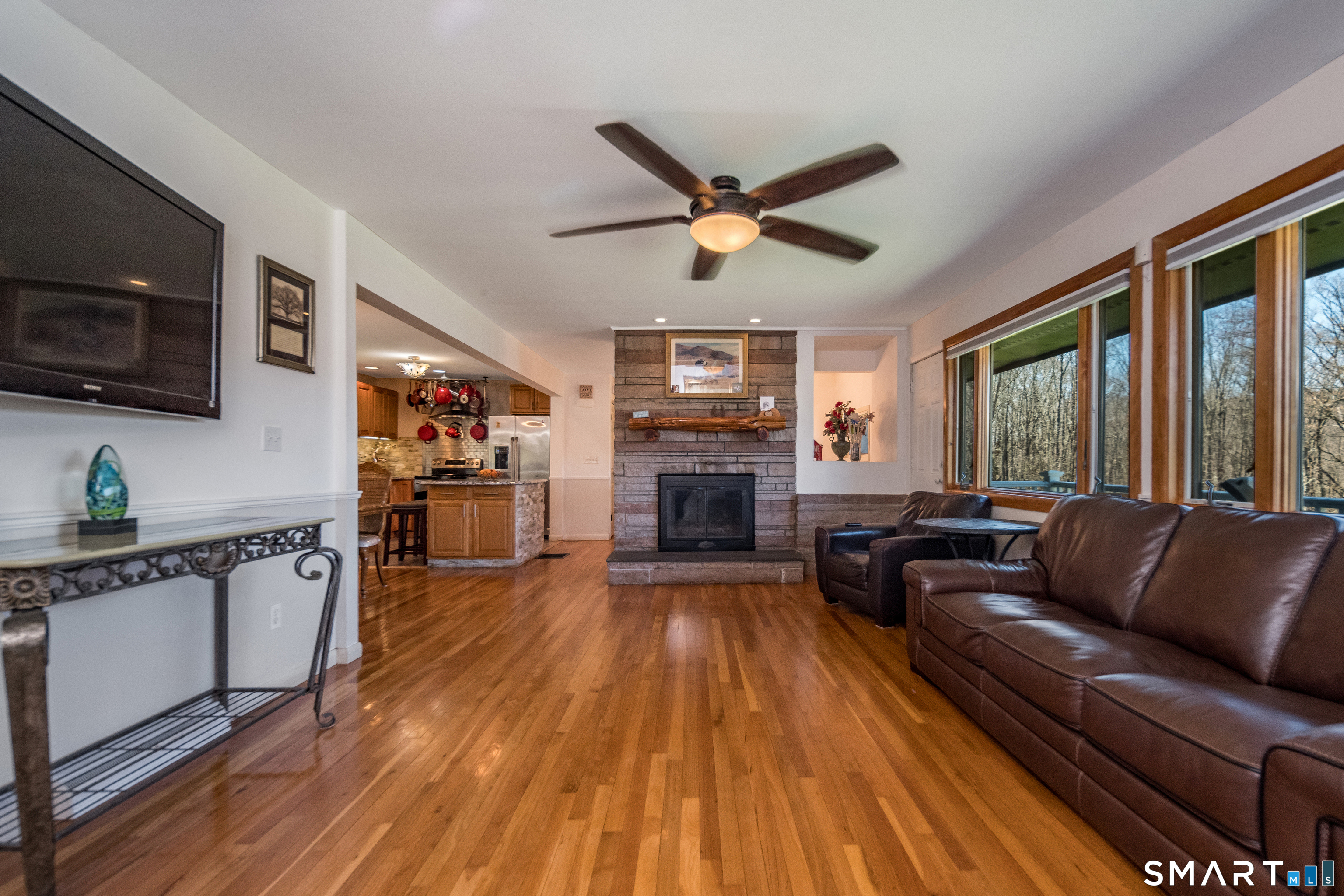 408 R Stage Coach Road Durham, CT 06422 - Photo 11 of 40 a living room with furniture fireplace and flat screen tv