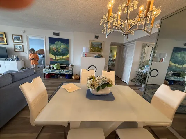 a view of a dining room with furniture