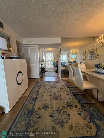 a view of a livingroom with furniture and a fireplace