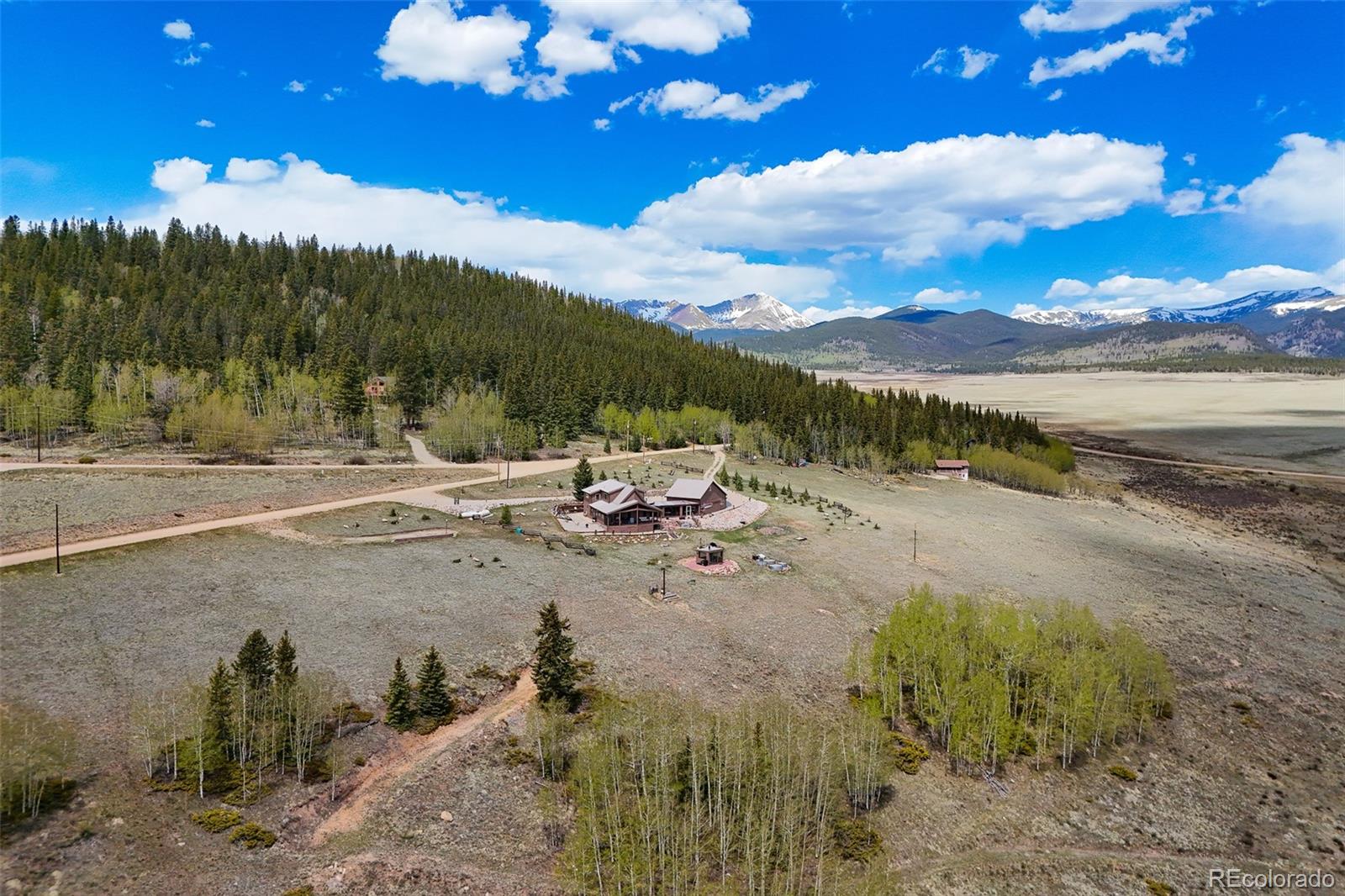 1163 Michigan Hill Road Jefferson, CO 80456 - Photo 45 of 48 a view of a lake with a mountain
