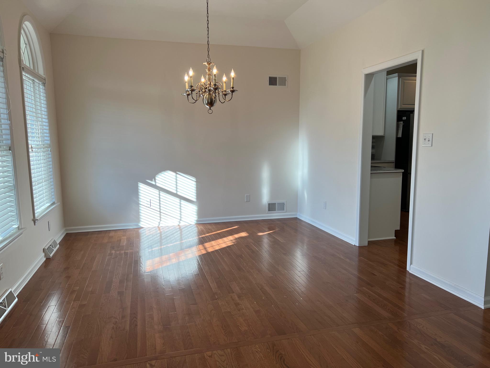 6337 Medina Ridge Drive Fayetteville, PA 17222 - Photo 17 of 50 a view of an empty room with wooden floor and a window