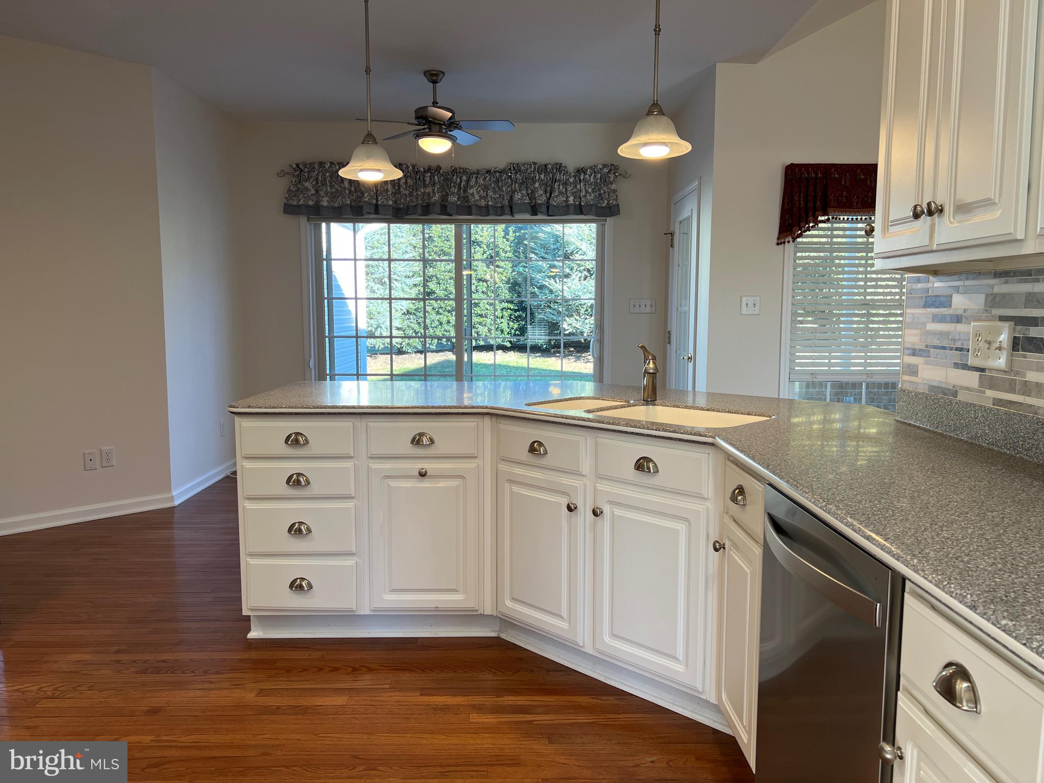 6337 Medina Ridge Drive Fayetteville, PA 17222 - Photo 22 of 50 a kitchen with white cabinets and window