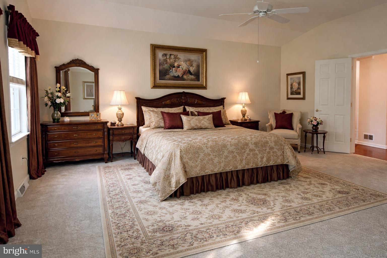 6337 Medina Ridge Drive Fayetteville, PA 17222 - Photo 29 of 50 a bedroom with a bed and a lamp on dresser