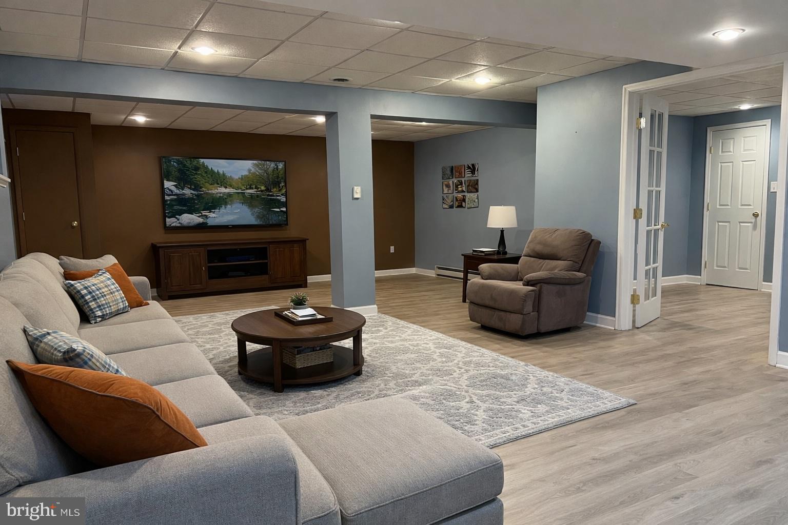 6337 Medina Ridge Drive Fayetteville, PA 17222 - Photo 34 of 50 a living room with furniture and a flat screen tv