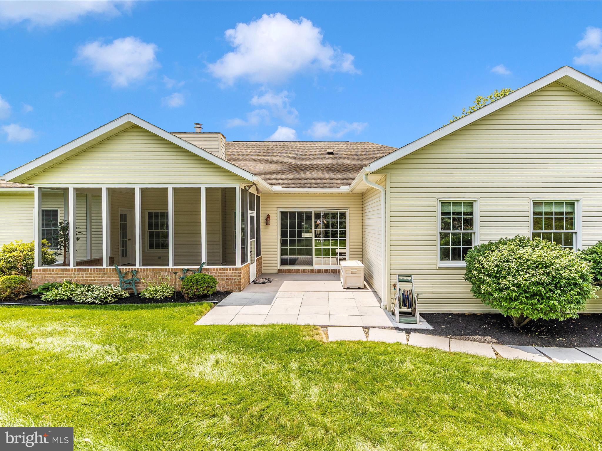 6337 Medina Ridge Drive Fayetteville, PA 17222 - Photo 9 of 50 a front view of a house with garden